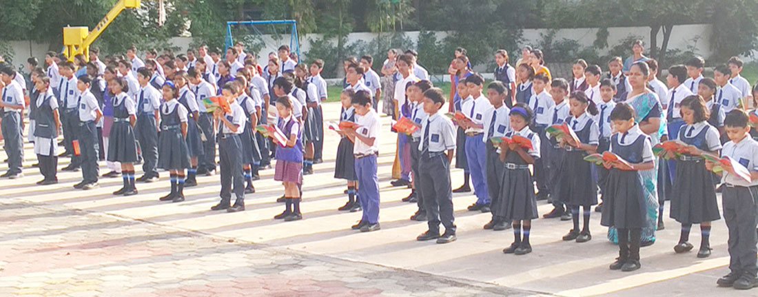 RGHSS students and teachers gathered in the school courtyard