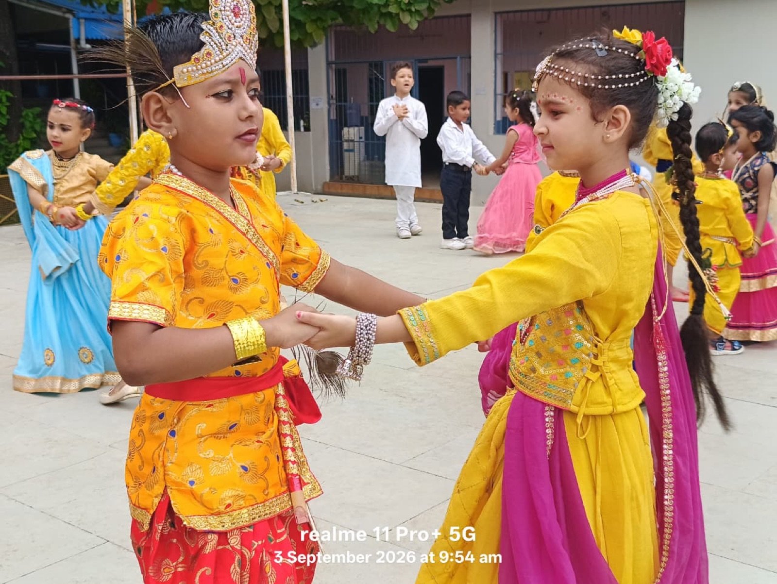 Students presenting a Krishna Janmashtami cultural performance